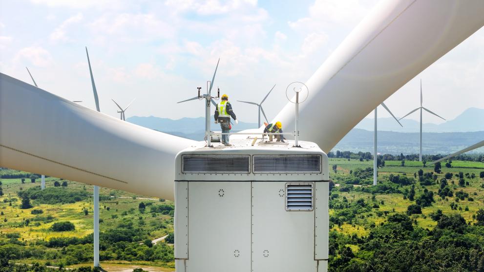 Workers on the turbine of a windmill